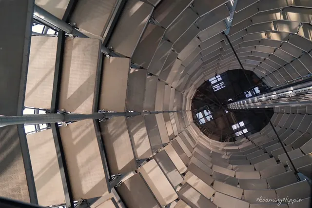 The spiral of a glass car tower seen from inside